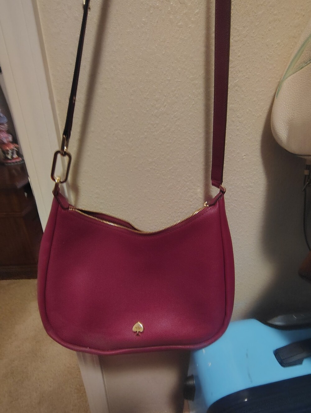 kate spade magenta shoulder bag with gold-tone accents